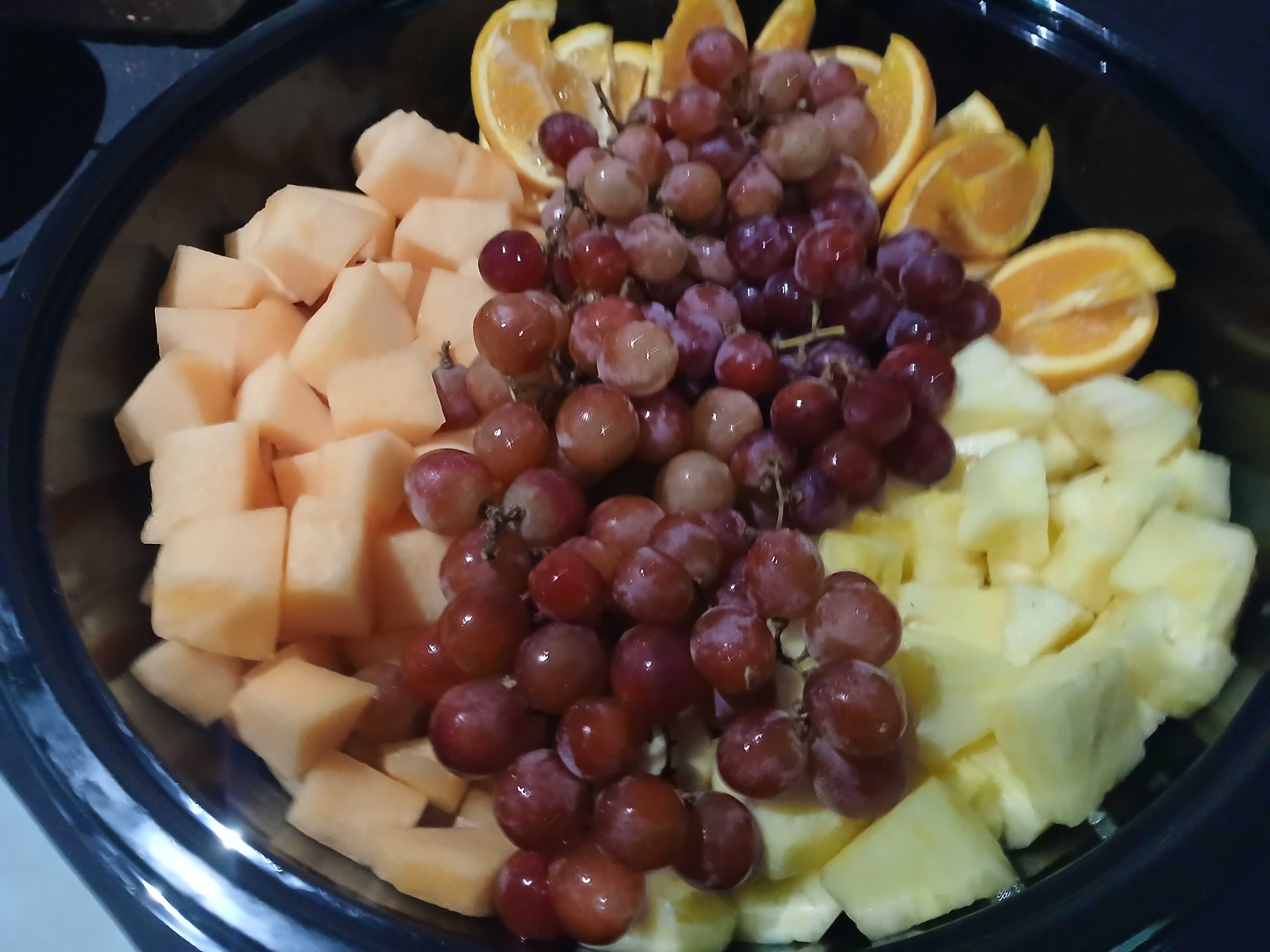 Fresh fruit bowl with grapes and cantaloupe — Atlanta Craft Services drop catering side for film productions