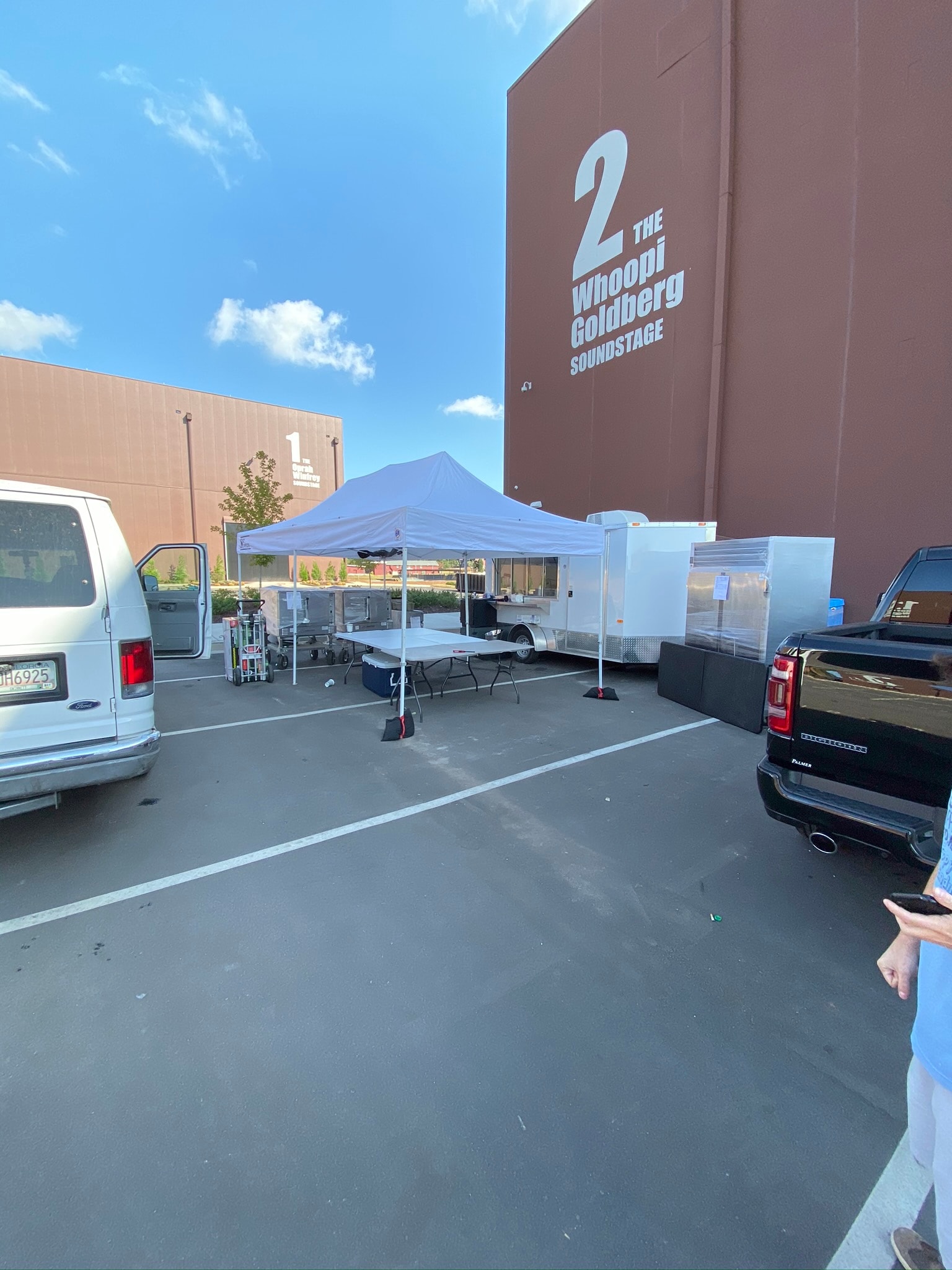 Atlanta Craft Services craft service trailer and tent setup in the parking lot outside the Whoopi Goldberg Soundstage at Tyler Perry Studios, Atlanta